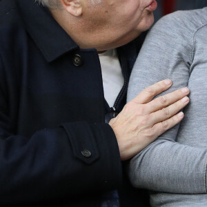 Pierre Ménès et sa compagne Mélissa Acosta dans les tribunes lors du match de ligue des champions de l'UEFA opposant le Paris Saint-Germain contre l'Étoile rouge de Belgrade au parc des Princes à Paris, France, le 3 octobre 2018. Le PSG gagne 6-1. © Cyril Moreau/Bestimage