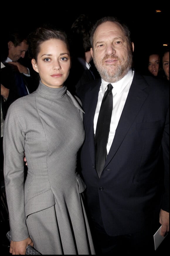 Harvey Weinstein et Marion Cotillard au défilé Dior à Paris, en 2008.