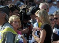 Lance Armstrong retrouve sa compagne et leur bébé de 7 semaines en descendant du podium du Tour de France !