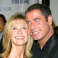 John Travolta et Olivia Newton-John lors des 90 ans de Paramount Home Entertainment le 25 septembre 2002. 