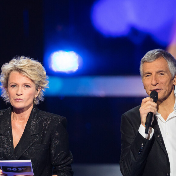 Sophie Davant, Nagui, Jean Paul Rouve - Deuxième jour de la 33ème édition du Téléthon au Parc de la Villette à Paris le 7 décembre 2019. © Tiziano Da Silva/Bestimage
