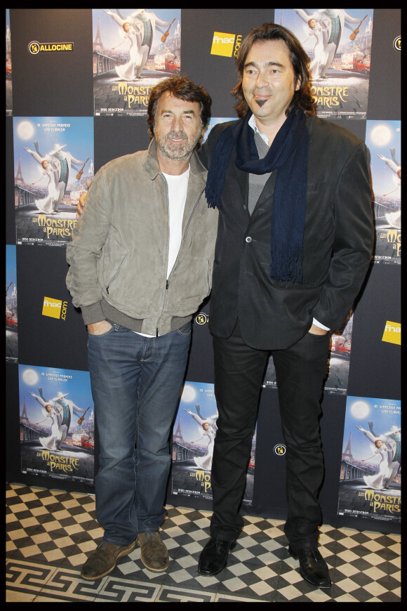 François Cluzet et Eric Bergeron à l'avant-première du film "Un monstre à Paris", au cinéma Le Trianon, le 8 octobre 2011. 