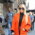 Jessica Simpson porte un long manteau orange dans les rues de New York, le 25 septembre 2019