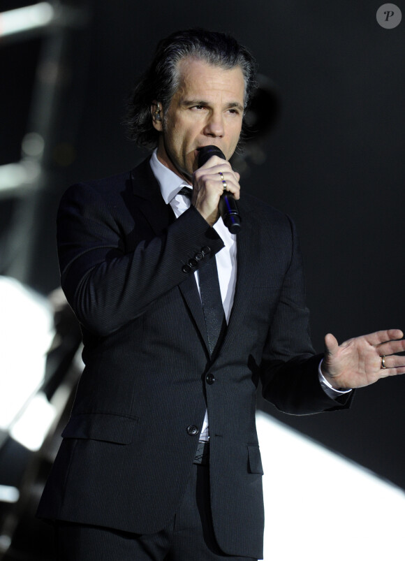 Bruno Pelletier (Pierre Gringoire dans "Le temps des cathedrales") - Les chanteurs de la comédie musicale Notre-Dame de Paris en concert au stade Olympiysky à Moscou. Le 7 mars 2013