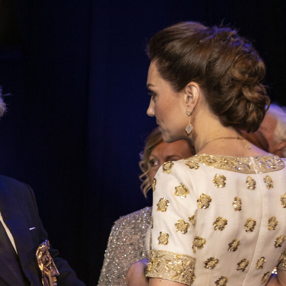 Catherine Kate Middleton, la duchesse de Cambridge et Andy Serkis, Sam Mendes lors de la 73e cérémonie des British Academy Film Awards (BAFTA) au Royal Albert Hall à Londres, le 2 février 2020.