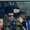 Exclusif - Joey Starr (JoeyStarr) avec une mystérieuse inconnue dans les tribunes lors du match de Ligue 1 opposant le Paris Saint-Germain à l'AS Monaco au Parc des Princes à Paris, France, le 12 janvier 2020.