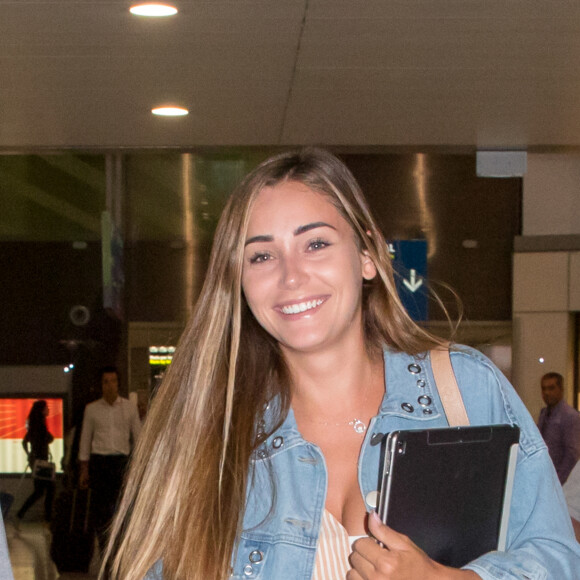 Charlotte Pirroni (compagne de Florian Thauvin) - Les familles des joueurs de l'équipe de France de football et les célébrités arrivent à l'aéroport de Paris-Charles-de-Gaulle après le dernier match de poule de l'équipe de France lors de la coupe du monde en Russie, à Roissy-en-France, France, le 27 juin 2018.