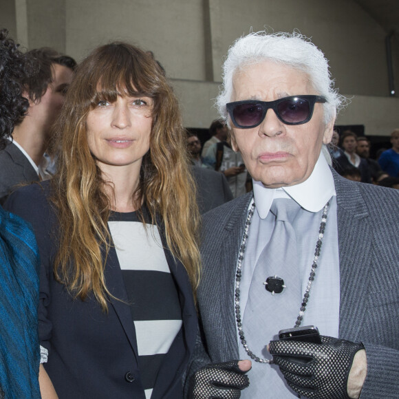 Haider Ackermann, Caroline de Maigret et Karl Lagerfeld au défilé Christian Dior homme printemps-été 2015 au Tennis Club de Paris, le 28 juin 2014.