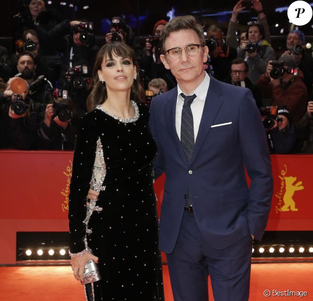Bérénice Bejo et son mari Michel Hazanavicius assistent à la cérémonie d'ouverture du 70e Festival International du Film de Berlin, La Berlinale, avec la projection du film "My Salinger Year". Le 20 février 2020.