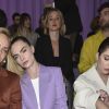 Amber Valletta, Cara Delevingne et sa femme Ashley Benson assistent au défilé de mode "BOSS" collection Automne-Hiver 2020-2021 lors de la fashion week à Milan, le 23 février 2020.