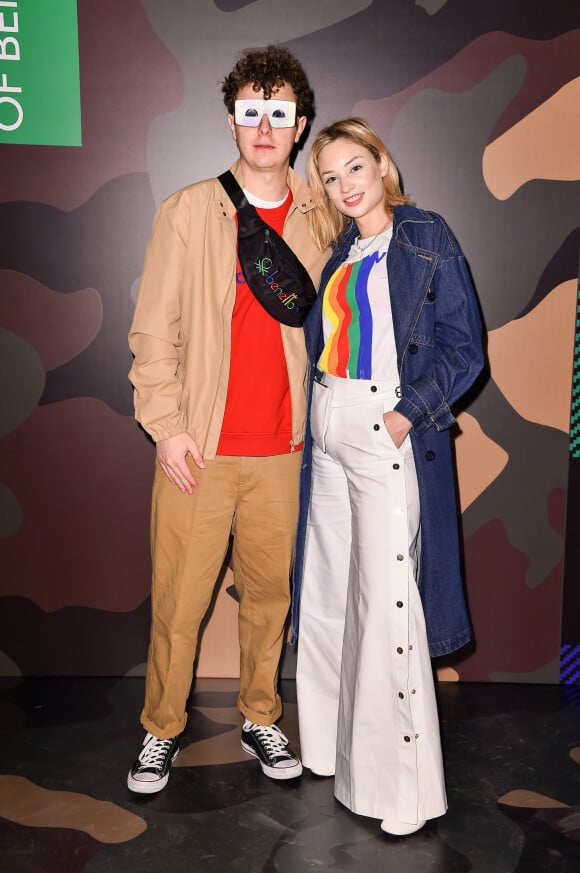 Norman Thavaud et sa compagne Martha Gambet assistent à la présentation de la nouvelle collection Automne-Hiver 2020-2021 de "United Colors of Benetton" lors de la Fashion Week de Milan. Le 20 février 2020.