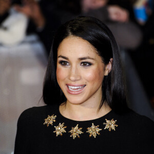 De passage à Londres pour la premiere de 'The Hunger Games: Catching Fire' en 2013, Meghan Markle avait misé sur des faux-cils, un fard irisé et un teint naturel.