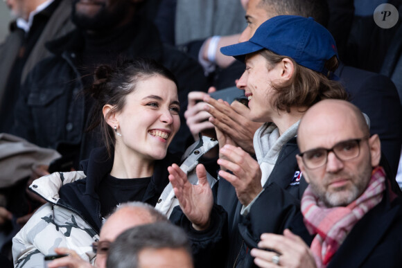 Pierre Sarkozy et une amie dans les tribunes lors du match de Ligue 1 "PSG - Dijon (4-0)" au Parc des Princes, le 29 février 2020. © Cyril Moreau/Bestimage