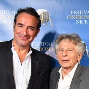 Jean Dujardin et Roman Polanski durant la soirée de clôture de la 1ère édition du Festival Ciné Roman à Nice le 26 octobre 2019. © Bruno Bebert / Bestimage