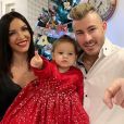 Julia Paredes, son chéri Maxime et leur fille Luna réunis pour leur premier Noël à trois, le 24 décembre 2018.