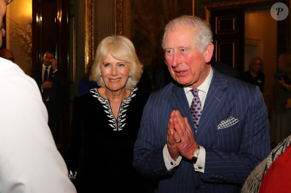 Le prince Charles, prince de Galles, et Camilla Parker Bowles, duchesse de Cornouailles, assistent à la réception organisée pour la Journée du Commonwealth à Marlborough House à Londres, le 9 mars 2020.