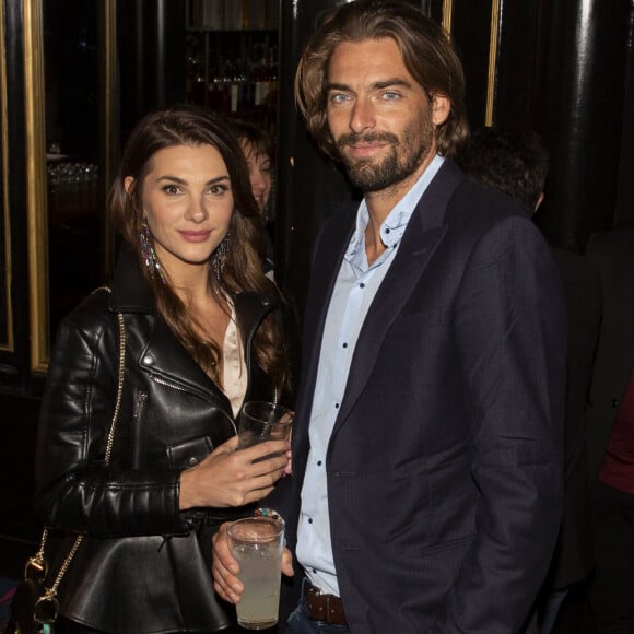 Camille Lacourt et sa compagne Alice Detollenaere (Miss Bourgogne 2010) lors de la soirée de lancement de la vodka "Touché" (vodka parisienne) au restaurant Castel à Paris, France, le 26 septembre 2019. © Jack Tribeca/Bestimage