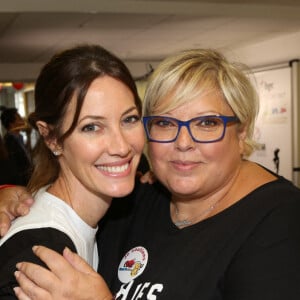 Laurence Boccolini et Mareva Galanter - 13e édition du Charity Day dans la salle des marchés d'Aurel BGC dans le quartier de la Bourse à Paris le 11 septembre 2017. @Jerome Domine/ABACAPRESS.COM