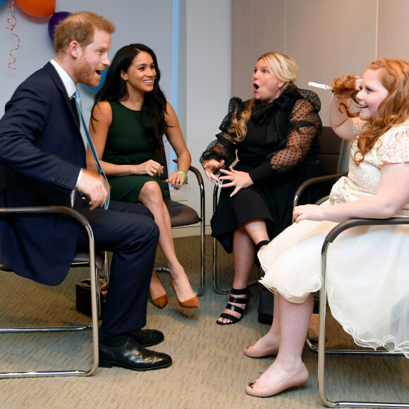 Le prince Harry, duc de Sussex, et Meghan Markle, duchesse de Sussex, lors de la soirée des WellChild Awards à l'hôtel Royal Lancaster à Londres le 15 octobre 2019.