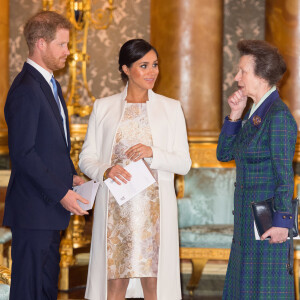 Le prince Harry, duc de Sussex, et Meghan Markle (enceinte), duchesse de Sussex, la princesse Anne - La famille royale d'Angleterre lors de la réception pour les 50 ans de l'investiture du prince de Galles au palais Buckingham à Londres. Le 5 mars 2019