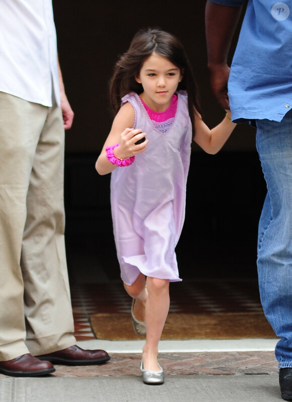 Tom Cruise et sa fille Suri Cruise quittent l'hôtel Greenwich à New York, le 11 juin 2012.