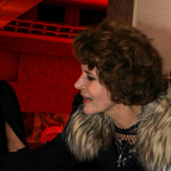 Fanny Ardant et Monica Bellucci lors du vernissage de l'exposition consacrée à l'oeuvre et l'imaginaire de Christian Louboutin "l'Exhibitionniste' (L'Exibition[niste]) au Palais de la Porte Dorée, à Paris, France, le 24 février 2020. © Philippe Baldini/Bestimage