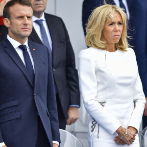 Emmanuel Macron, président de la République Française, et la Première dame Brigitte Macron lors du 139ème défilé militaire du 14 juillet sur les Champs-Elysées, jour de la Fête Nationale. Paris, le 14 juillet 2019. © Lemouton-Gorassini-Perusseau/Bestimage