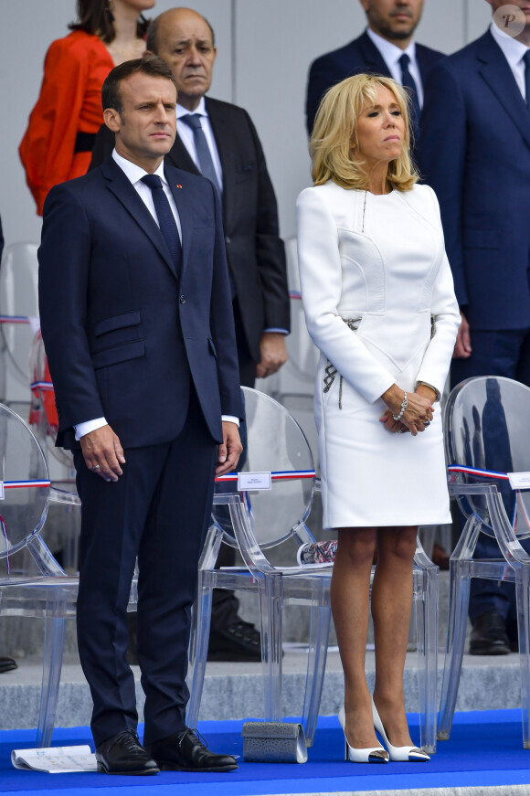 Emmanuel Macron, président de la République Française, et la Première dame Brigitte Macron lors du 139ème défilé militaire du 14 juillet sur les Champs-Elysées, jour de la Fête Nationale. Paris, le 14 juillet 2019. © Lemouton-Gorassini-Perusseau/Bestimage