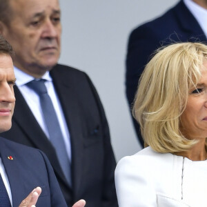 Emmanuel Macron, président de la République Française, et la Première dame Brigitte Macron lors du 139ème défilé militaire du 14 juillet sur les Champs-Elysées, jour de la Fête Nationale. Paris, le 14 juillet 2019. © Lemouton-Gorassini-Perusseau/Bestimage