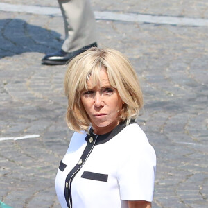 Brigitte Macron et le président de la république française, Emmanuel Macron assistent au défilé militaire à l'occasion de la Fête nationale, sur les champs Elysées, Paris, France. Le 14 juiilet 2018. © Stéphane Lemouton / Bestimage