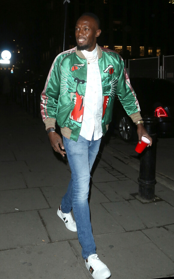 Usain Bolt se rend au club "Tape" à Londres ou il fera la fête jusqu'à 3 heures du matin avec le chanteur Drake le 9 avril 2019.