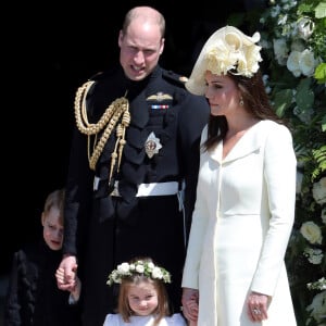 Le prince William, duc de Cambridge, Catherine (Kate) Middleton, duchesse de Cambridge, Le prince George de Cambridge et La princesse Charlotte de Cambridge - Les invités à la sortie de la chapelle St. George au château de Windsor, Royaume Uni, le 19 mai 2018.