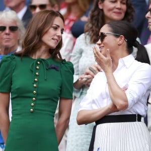 Catherine (Kate) Middleton, duchesse de Cambridge, Meghan Markle, duchesse de Sussex, et Pippa Middleton dans les tribunes lors de la finale femme de Wimbledon "Serena Williams - Simona Halep (2/6 - 2/6) à Londres, le 13 juillet 2019.