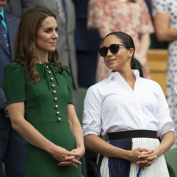 Catherine (Kate) Middleton, duchesse de Cambridge, Meghan Markle, duchesse de Sussex, et Pippa Middleton dans les tribunes lors de la finale femme de Wimbledon "Serena Williams - Simona Halep (2/6 - 2/6) à Londres, le 13 juillet 2019.