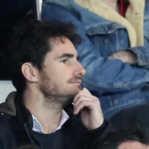 Jean-Luc Reichmann et sa femme Nathalie dans les tribunes du match de football de Ligue 1 PSG - Monaco au Parc des Princes à Paris, le 15 avril 2018. Le PSG a battu Monaco 7-1 et s'offre son 7ème titre de champion de France avant la fin de la saison.15/04/2018 - Paris