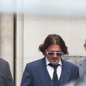 Après une journée de procès contre le magazine "The Sun", Johnny Depp quitte la cour royale de justice à Londres. Le 7 juillet 2020.
