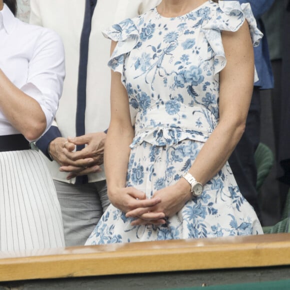 Catherine (Kate) Middleton, duchesse de Cambridge, Meghan Markle, duchesse de Sussex, et Pippa Middleton dans les tribunes lors de la finale femme de Wimbledon "Serena Williams - Simona Halep (2/6 - 2/6) à Londres, le 13 juillet 2019.