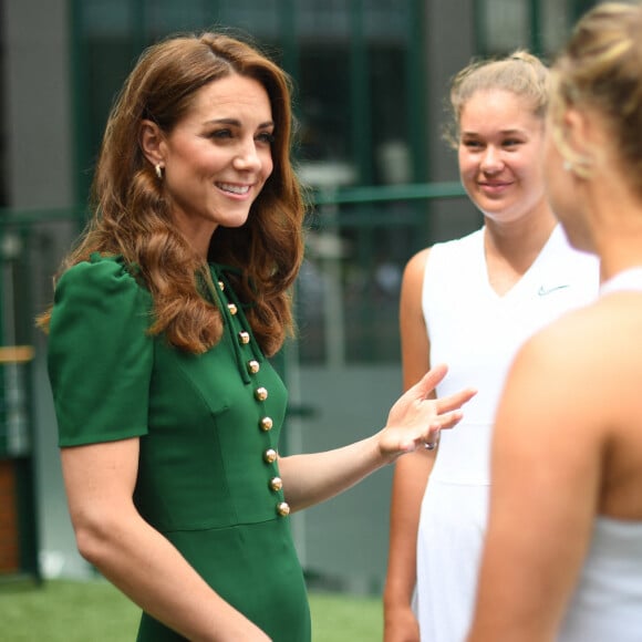 Catherine (Kate) Middleton, duchesse de Cambridge arrive à Wimbledon pour la finale féminine à Londres, le 13 juillet 2019.