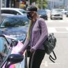 Paris Hilton et son compagnon Carter Reum font leurs courses en BMW à Los Angeles, le 3 juillet 2020.
