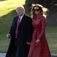 Le président américain Donald J. Trump et la première dame Melania Trump marchent sur la pelouse sud de la Maison Blanche à Washington DC, États-Unis, le vendredi 14 février 2020, alors qu'ils partent pour un week-end à Mar-a- Lago.