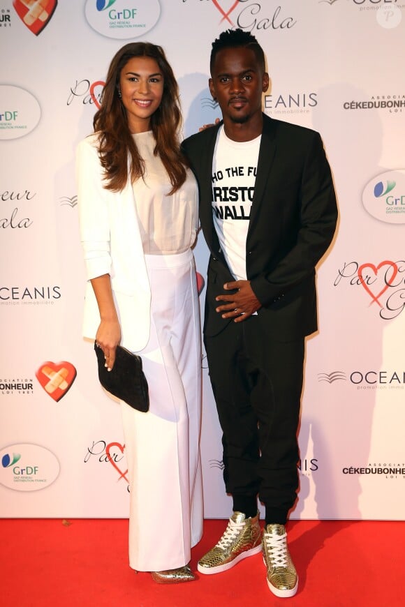Black M (Alpha Diallo) et sa femme Léa - Personnalités au gala "Par Coeur" pour les 10 ans de l'association "Cekedubonheur" au pavillon d'Armenonville à Paris. Le 24 septembre 2015
