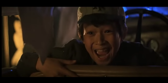 L'acteur Jonathan Ke Quan interprète le rôle de Demi-Lune dans "Indiana Jones et le temple maudit", en 1984. 