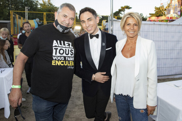 Exclusif - Jean-Marie Bigard, Jordan de Luxe et Caroline Margeridon - Inauguration de la Fête à Neuneu au profit de l'association "Innocence En Danger" au Bois de Boulogne à Paris, France, le 4 septembre 2020. Jean-Marie Bigard porte un masque assorti à son célèbre T-shirt. © Jack tribeca/Bestimage