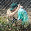 Exclusif - Ashley Benson embrasse son compagnon G-Eazy en marge du tournage d'un nouveau clip du rappeur à Malibu, le 3 septembre 2020.