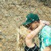 Exclusif - Ashley Benson embrasse son compagnon G-Eazy en marge du tournage d'un nouveau clip du rappeur à Malibu, le 3 septembre 2020.