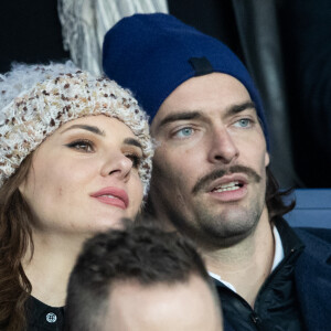 Camille Lacourt et sa compagne Alice Detollenaere (Miss Bourgogne 2010) dans les tribunes lors du match de championnat de Ligue 1 Conforama opposant le Paris Saint-Germain (PSG) aux Girondins de Bordeaux au Parc des Princes à Paris, France, le 23 février 2020. Le PSG a gagné 4-3. © Cyril Moreau/Bestimage 