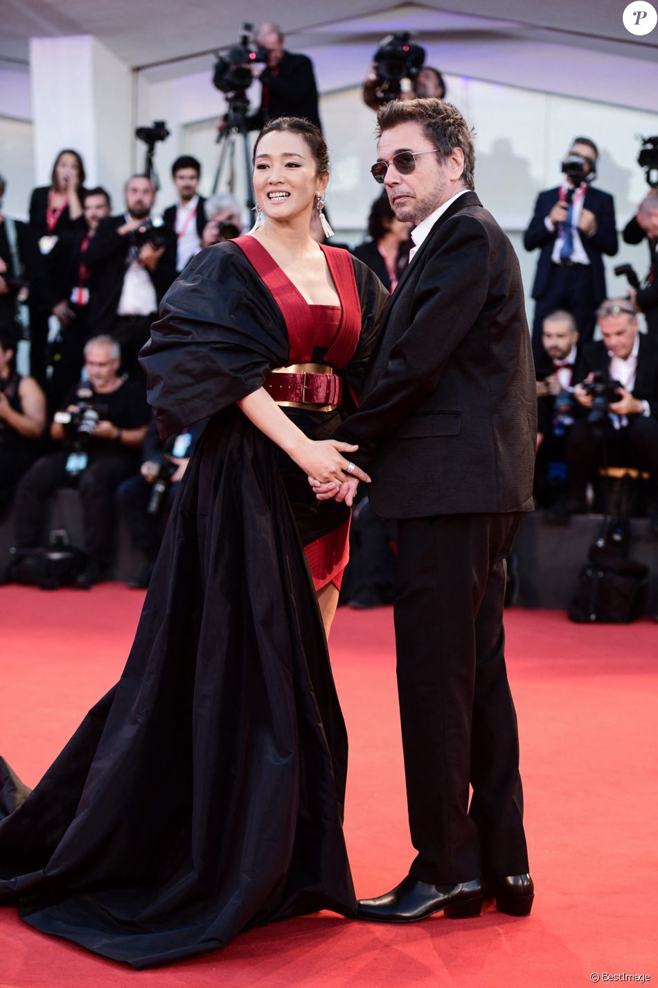 Gong Li et son compagnon Jean-Michel Jarre - Tapis rouge du film Lan ...