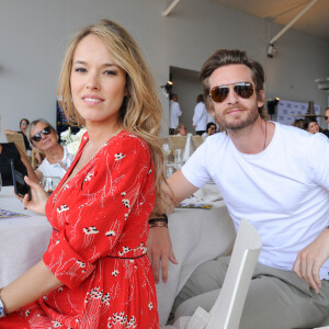 Exclusif - Philippe Lacheau et sa compagne Elodie Fontan (Marraine du LGCT - LPEJ 2019) - People dans la tente VIP - Longines Paris Eiffel Jumping au Champ de Mars à Paris, le 7 juillet 2019. 