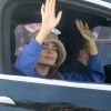 Exclusif - Emily Ratajkowski enceinte et son mari ebastian Bear-McClard fêtent la victoire de Biden dans leur voiture à Los Angeles le 7 novembre 2020. 