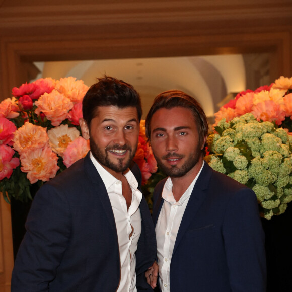 Christophe Beaugrand et son mari Ghislain Gerin au cocktail de la 10ème édition du "Global Gift Gala" à l'hôtel Four Seasons George V à Paris, le 3 juin 2019. © Cyril Moreau/Global Gift Foundation/Bestimage